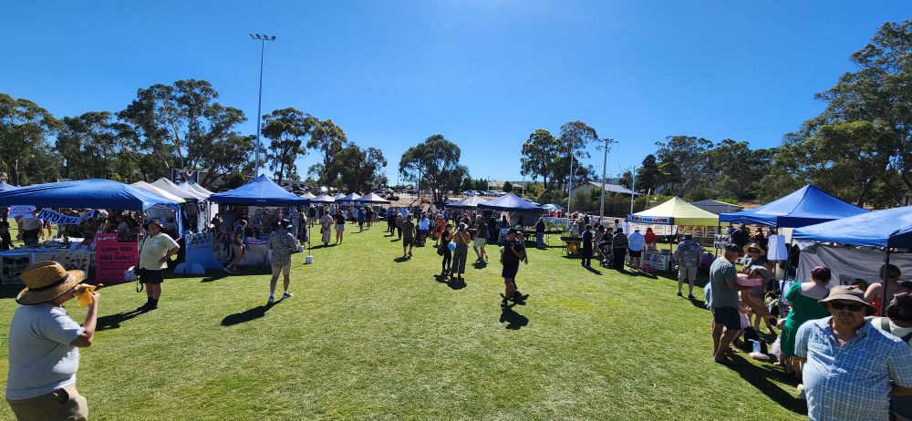 Harcourts Applefest Festival Crowd Tents Sunny Grass Field